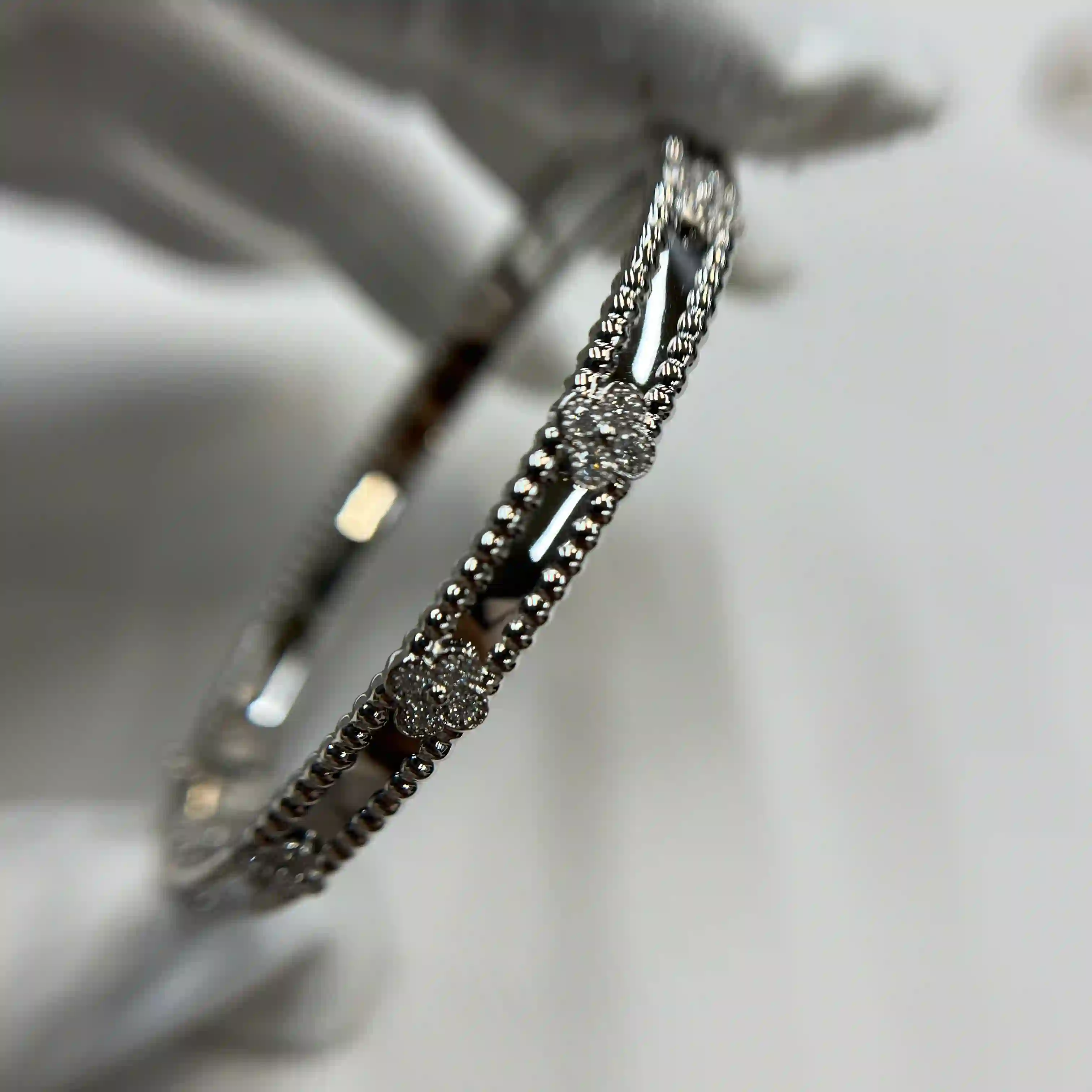 18K White Gold Van Cleef Arpels Perlée Sweet Clovers Bracelet Medium Model VCARP6XA00 (1) 18K White Gold Van Cleef Arpels Perlée Sweet Clovers Bracelet Medium Model VCARP6XA00